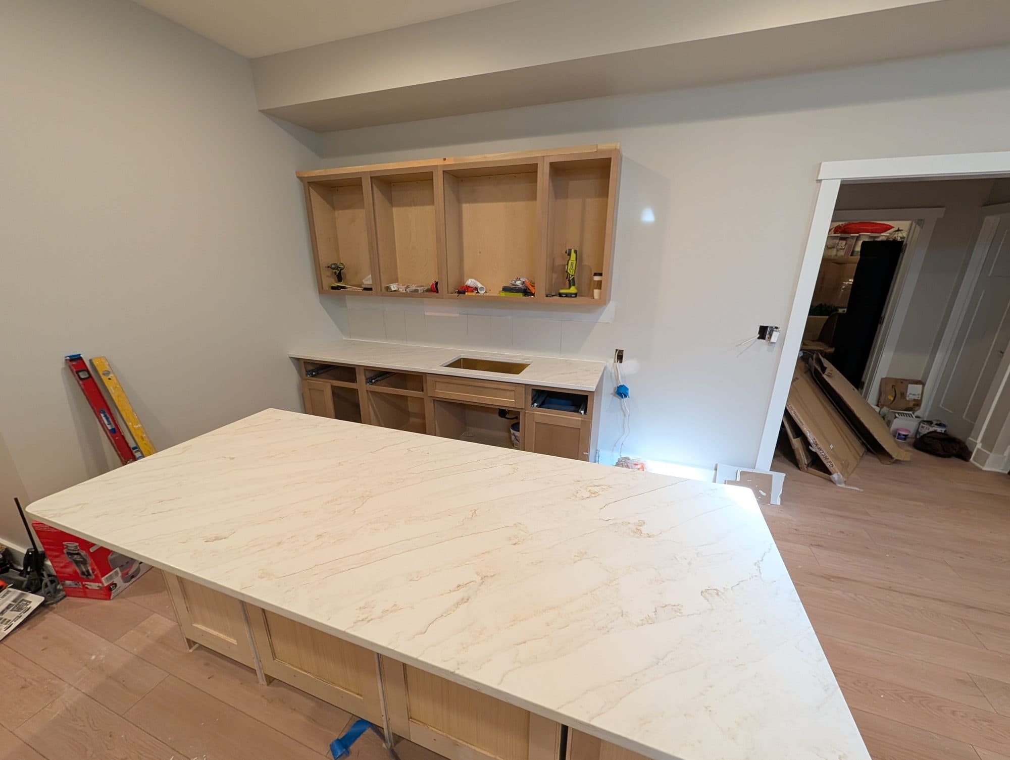 Basement wet bar with countertop installed, before the tile backsplash was added